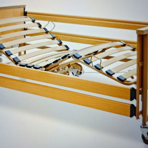 Electric hospital bed very adjustable like new with traction and brakes