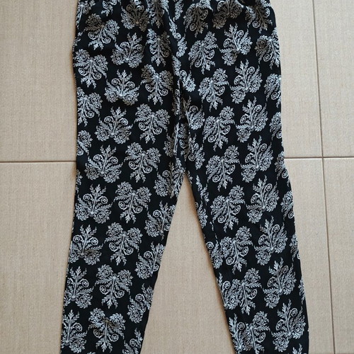 Flowy pants with black and white pattern, size S