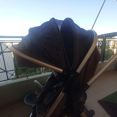 Multifunctional stroller used, foldable in two parts, beige brown gold
