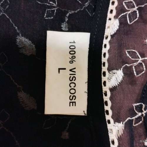Blouse new with transparency and embroidery in black and white