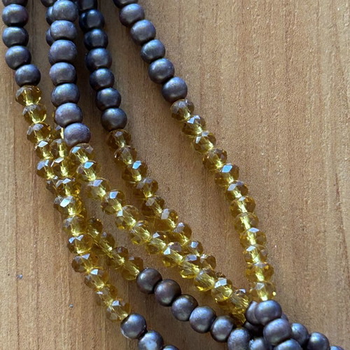 Set of 2 necklaces like new, silver and brown tones