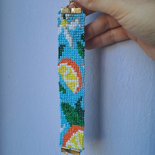 Handmade women's bracelet new with design, blue and yellow