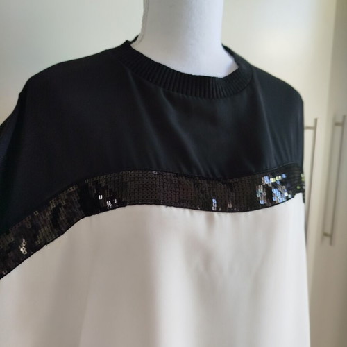 Figaro blouse black and white with wide sleeve and black sequins like new