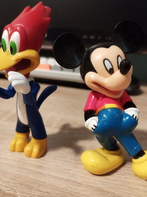 Mickey Mouse and Woody figures like new