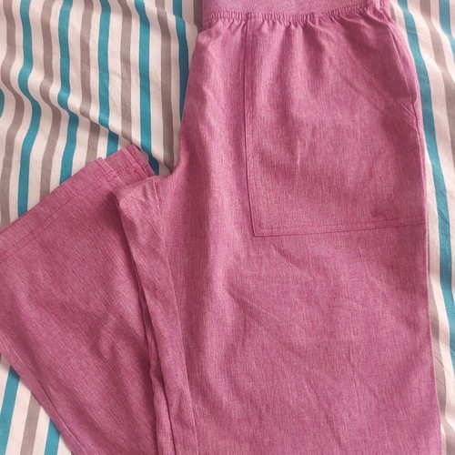 Koi nursing scrub new unworn, size S, rotten apple color