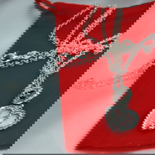 ασημένια αλυσίδα με ασημένιο κρεμαστό