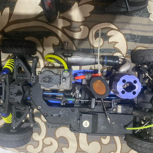 Kyoso WFO5 remote control car used with many extras and gear issue