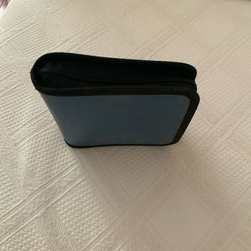 CD case like new, holds 24 CDs, ideal for car use