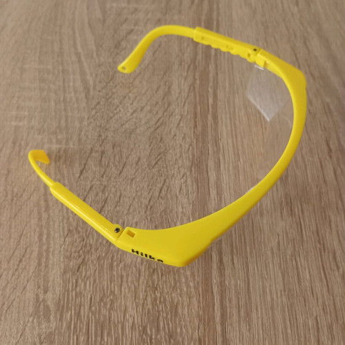 Hilka safety glasses used with adjustment and cord holes