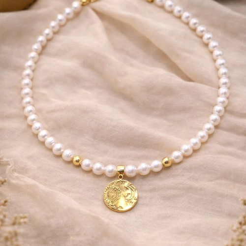 Necklace with cultured pearls and gold sun and moon element new
