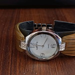 Women's watch like new with silver and bone bracelet
