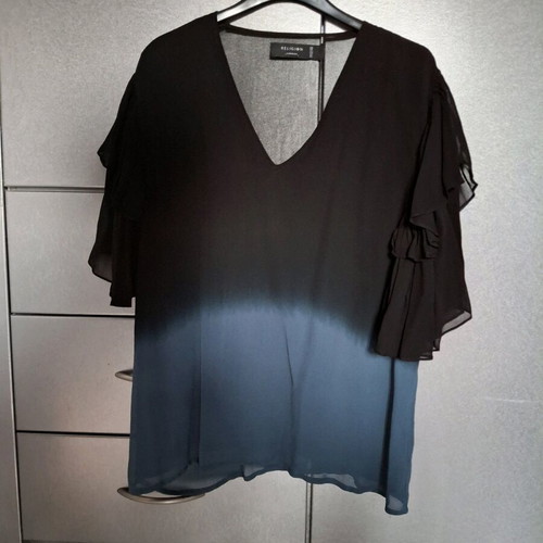 Religion blouse like new, black and blue with transparent back