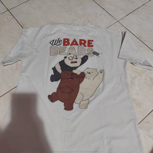 White short-sleeve T-shirt with figures size S like new