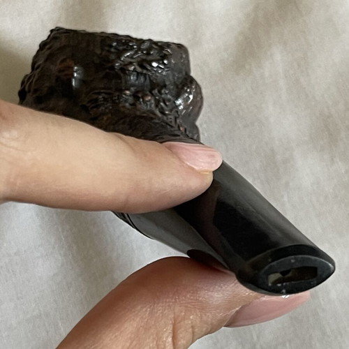 Handmade Czech wooden smoking pipe used with signs of wear