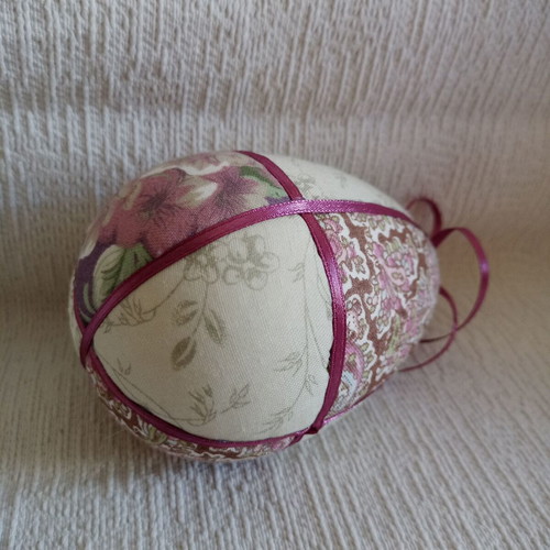 Decorative pink lilac floral egg used for Easter and spring decor