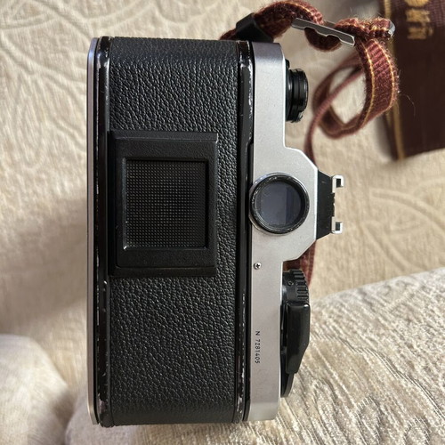 Nikon FM2 35 mm camera used with Telezon telephoto lens and lens cap