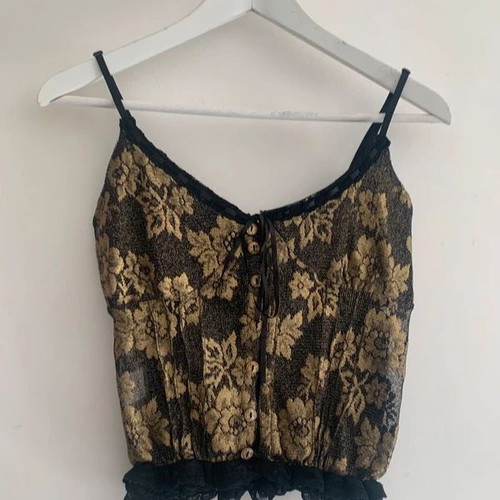 Top M Ake' black and gold used with lace detail