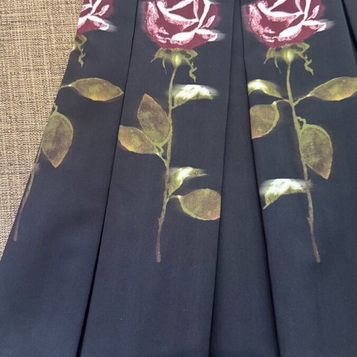 Spell skirt almost unused, black with rose design