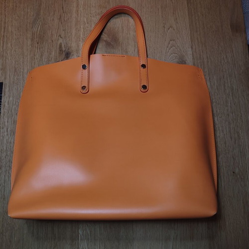 Leather handbag used, orange with multiple compartments