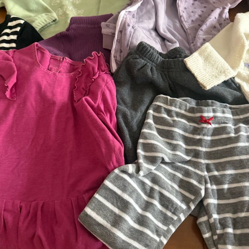 Used clothing pack for 2-3 years with blouses, pants, cardigans, dresses, and skirt