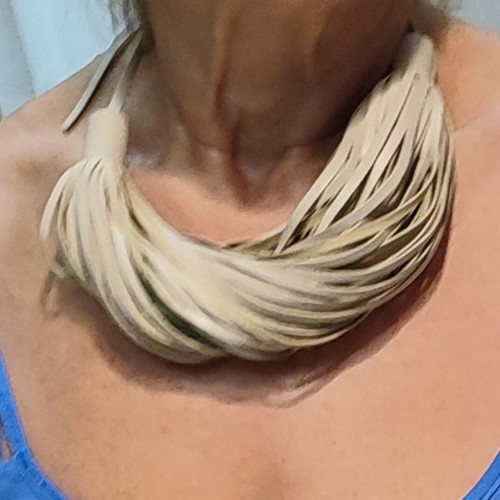 Necklace and bracelet set with leather tassels, beige nude