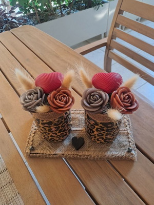 Decorative candle with wax flowers