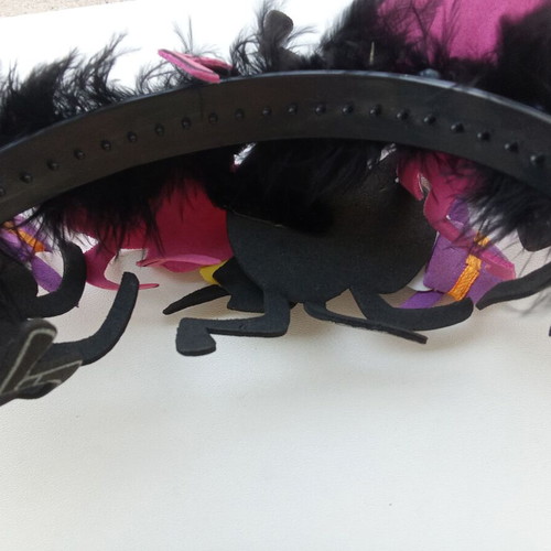 Children's Halloween headband used with spiders and feathers