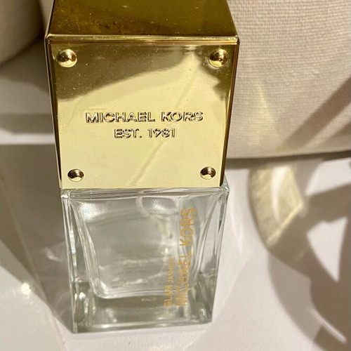 Michael Kors Glam Jasmine cologne bottle used 30ml