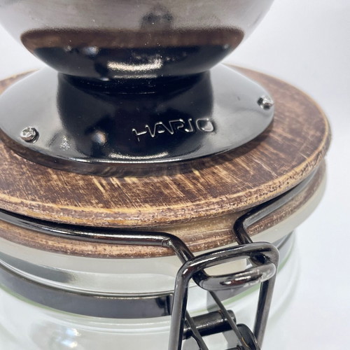 Hario manual coffee grinder like new with storage container