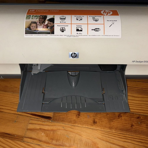 HP Deskjet D1560 printer used, ideal for small spaces with cables and ink