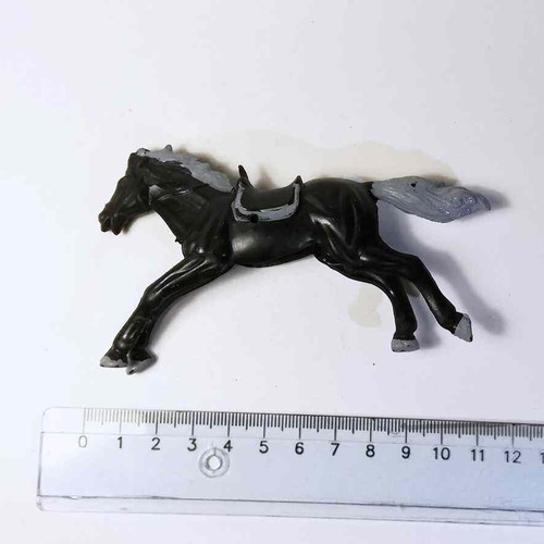 Plastic horse toy used with scratches and marks
