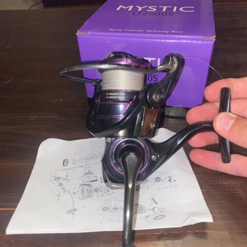 Oceanic Mystic LT2500S fishing reel with Shimano Kairiki line
