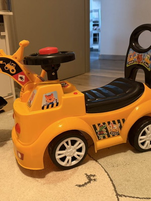 Bulldozer Karotina Baby ride-on toy with sound and light like new