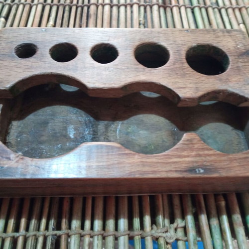 Wooden ashtray for brass weights used