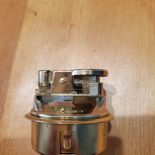 Metal vintage lighter like new with classic design and strong flame