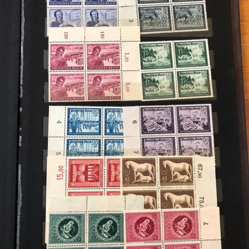 Stamp album with large collection of mint and used blocks worldwide