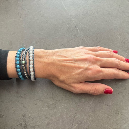 Leather bracelet like new with beads and blue evil eye detail
