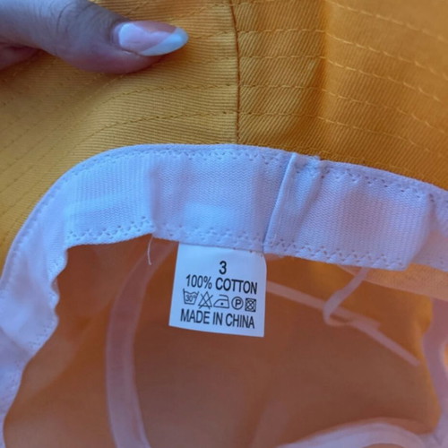 Hat new, orange with adjustable cords