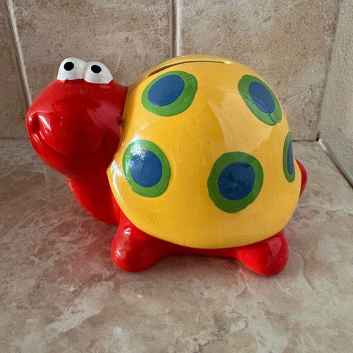 Ceramic snail piggy bank