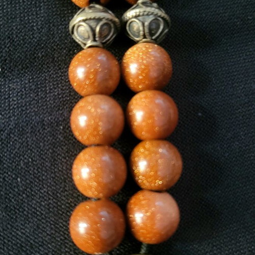 Komboloi made of goldstone and 925 silver like new