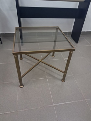 Square coffee table with glass top