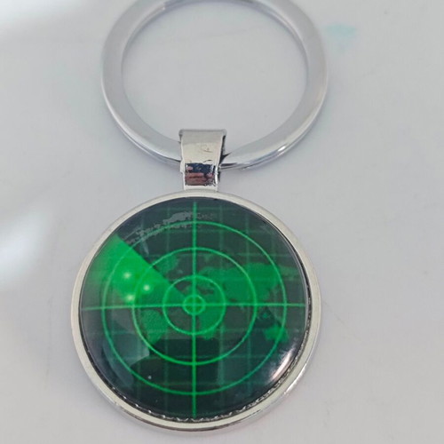 Metal keychain like new with green radar screen design