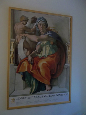 Vatican-themed framed art used