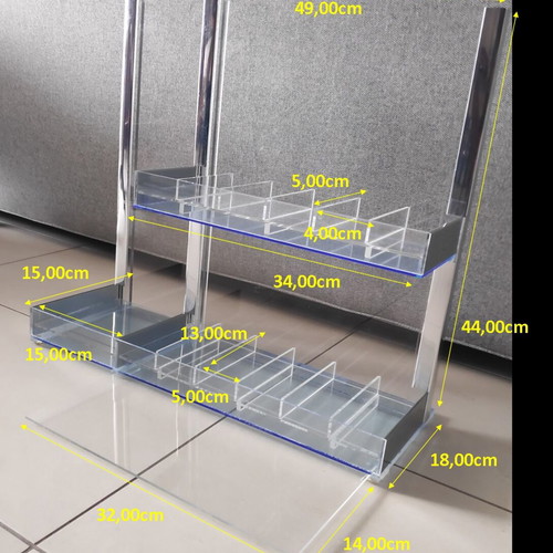 Tabletop plexiglass product display stand like new with metal decorations