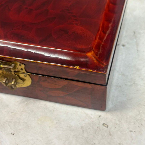 Vintage wooden jewelry box used with red satin lining