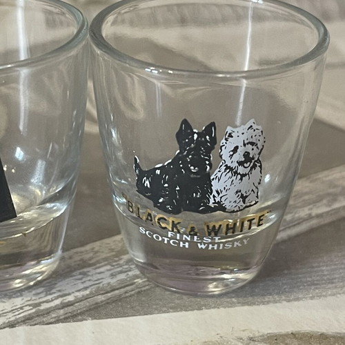 Whiskey Shot Glasses set of 4 like new, collectible labels