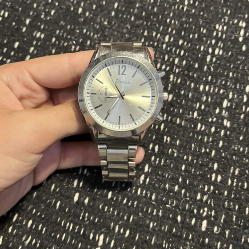 Xianan Quartz wristwatch unisex, like new, silver bracelet