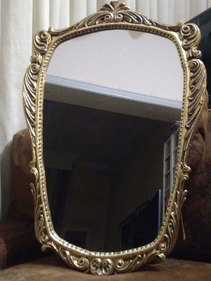 Vintage brass hanging mirror