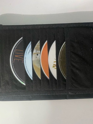 Car CD holder used, attaches to sun visor