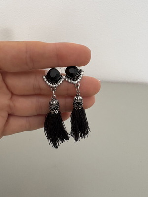 Black dangle earrings used
